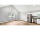 Modern kitchen with stainless steel appliances and granite countertops at 1818 Ingram St, Indianapolis, IN 46218