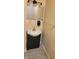 Bathroom with dark vanity and updated sink at 3310 N Kenwood Ave, Indianapolis, IN 46208