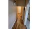 Long hallway with light brown wood flooring at 3310 N Kenwood Ave, Indianapolis, IN 46208