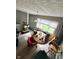 Casual dining area with hardwood floors and backyard view at 531 N Alton Ave, Indianapolis, IN 46222
