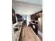 Kitchen with dark wood cabinets and laminate flooring at 531 N Alton Ave, Indianapolis, IN 46222