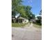 Cute house with a single car garage and a gravel driveway at 3912 Terrace Ave, Indianapolis, IN 46203