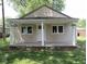 Charming one-story home with a covered porch at 3912 Terrace Ave, Indianapolis, IN 46203