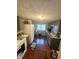 Well-equipped kitchen with gray cabinets and modern appliances at 3912 Terrace Ave, Indianapolis, IN 46203