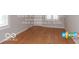 Living room with hardwood floors and lots of natural light at 3521 N Riley Ave, Indianapolis, IN 46218