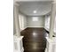 Open living room with hardwood floors and neutral walls at 20 N Pershing Ave, Indianapolis, IN 46222