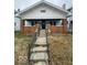 Charming craftsman home with brick details and porch at 57 N Tremont St, Indianapolis, IN 46222