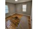 Spacious bedroom with hardwood floors and neutral walls at 1618 N Linwood Ave, Indianapolis, IN 46218