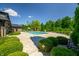 Inviting in-ground pool with ample patio space for entertaining at 4023 Cedar Hills N Dr, Greenwood, IN 46143
