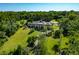 Spacious home surrounded by lush greenery and landscaping at 4023 Cedar Hills N Dr, Greenwood, IN 46143