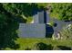 Detached garage with a large paved parking area at 4023 Cedar Hills N Dr, Greenwood, IN 46143