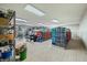 Large workshop with ample storage shelving and bins at 4023 Cedar Hills N Dr, Greenwood, IN 46143