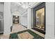 Spacious hallway with a water feature and marble flooring at 4023 Cedar Hills N Dr, Greenwood, IN 46143