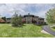 Grand estate showcasing a manicured lawn and circular driveway at 4023 Cedar Hills N Dr, Greenwood, IN 46143