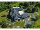 Luxury home with a large pool and circular driveway at 4023 Cedar Hills N Dr, Greenwood, IN 46143