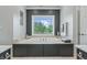 Bathroom with large soaking tub and window at 4023 Cedar Hills N Dr, Greenwood, IN 46143