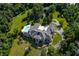 Luxury estate home featuring extensive landscaping and a large pool at 4023 Cedar Hills N Dr, Greenwood, IN 46143