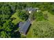 Detached garage with large parking area and lush landscaping at 4023 Cedar Hills N Dr, Greenwood, IN 46143