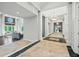 Long hallway leading to living areas with high ceilings at 4023 Cedar Hills N Dr, Greenwood, IN 46143