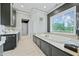 Bathroom with large soaking tub and window at 4023 Cedar Hills N Dr, Greenwood, IN 46143