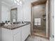 Bathroom boasts granite countertops and a large walk-in shower at 4023 Cedar Hills N Dr, Greenwood, IN 46143