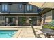Backyard retreat with a refreshing pool, expansive patio, and comfortable seating area for relaxation at 4023 Cedar Hills N Dr, Greenwood, IN 46143