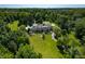 Beautiful home with a long driveway and lush green lawn at 4023 Cedar Hills N Dr, Greenwood, IN 46143