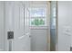 Small bathroom with shower and window at 4023 Cedar Hills N Dr, Greenwood, IN 46143