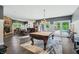 Game room with pool table, bar, and access to backyard pool at 4023 Cedar Hills N Dr, Greenwood, IN 46143