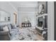Spacious living room with fireplace and large rug at 4023 Cedar Hills N Dr, Greenwood, IN 46143
