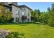 Luxury home with beautifully landscaped grounds and mature trees at 4023 Cedar Hills N Dr, Greenwood, IN 46143