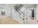 Elegant entryway with grand staircase, tile flooring, and views to other rooms at 4023 Cedar Hills N Dr, Greenwood, IN 46143