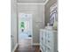 Bedroom with access to the backyard and a dresser at 4023 Cedar Hills N Dr, Greenwood, IN 46143