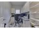 Home office with built-in shelving and a large desk at 4023 Cedar Hills N Dr, Greenwood, IN 46143