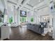 Two story living room with dark hardwood floors and high ceilings at 4023 Cedar Hills N Dr, Greenwood, IN 46143