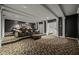 Elevated home theater seating with ample space for movie nights at 4023 Cedar Hills N Dr, Greenwood, IN 46143