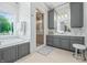 Elegant bathroom with double vanity, walk-in shower, and soaking tub at 4023 Cedar Hills N Dr, Greenwood, IN 46143