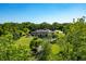 Elegant home nestled on a spacious lot with mature trees at 4023 Cedar Hills N Dr, Greenwood, IN 46143