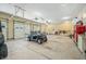Spacious garage with multiple bays and golf cart at 4023 Cedar Hills N Dr, Greenwood, IN 46143