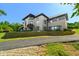 Stunning home with a large lawn and impressive curb appeal at 4023 Cedar Hills N Dr, Greenwood, IN 46143