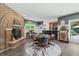 Game room with brick fireplace, pool table, and bar area at 4023 Cedar Hills N Dr, Greenwood, IN 46143