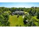 Luxury home on large lot with sprawling green lawn and mature trees at 4023 Cedar Hills N Dr, Greenwood, IN 46143
