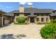 Brick home with inviting front porch and manicured landscaping at 4023 Cedar Hills N Dr, Greenwood, IN 46143