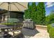 Outdoor kitchen area with built-in grill, perfect for summer barbecues and outdoor dining at 4023 Cedar Hills N Dr, Greenwood, IN 46143
