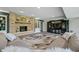 Finished basement with stone fireplace and built-in shelving at 4023 Cedar Hills N Dr, Greenwood, IN 46143