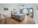 Charming bedroom with wood flooring, a comfy bed, and plenty of natural light at 4023 Cedar Hills N Dr, Greenwood, IN 46143