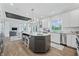 Modern kitchen with a large island and stainless steel appliances at 4023 Cedar Hills N Dr, Greenwood, IN 46143