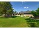 Luxury home with expansive lawn and detached garage at 4023 Cedar Hills N Dr, Greenwood, IN 46143
