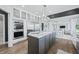 Spacious kitchen with large island, stainless steel appliances, and ample counter space at 4023 Cedar Hills N Dr, Greenwood, IN 46143