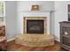 Brick fireplace with a white mantel in the living room at 917 Balto Dr, Shelbyville, IN 46176